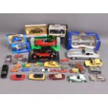 A selection of diecast toy vehicles, some boxed in