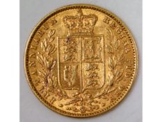 An 1869 Victorian full gold sovereign, 8g