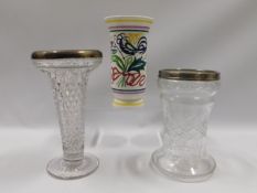 Two silver rimmed cut glass flower vases twinned w