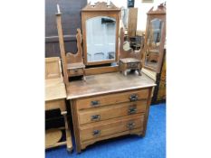 A satinwood dressing table with three drawers, 37i