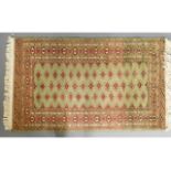 A vintage decorative wool rug, 61.5in x 37.25in