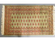 A vintage decorative wool rug, 61.5in x 37.25in