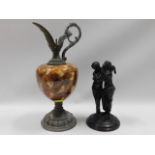 A 19thC. bronze couple twinned with later spelter