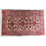 A vintage decorative wool rug, 53in x 31in