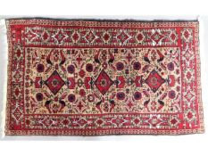 A vintage decorative wool rug, 53in x 31in