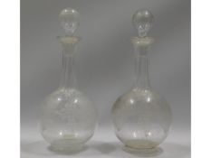 A pair of 19thC. etched glass decanters with origi