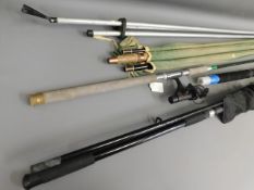 A Shakespeare beach casting rod, two other rods &