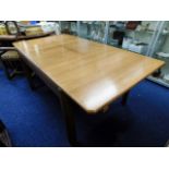 A Heals Of London oak extending dining table, 72in