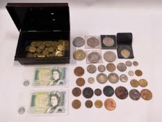 A quantity of mixed coinage & two one pound notes,
