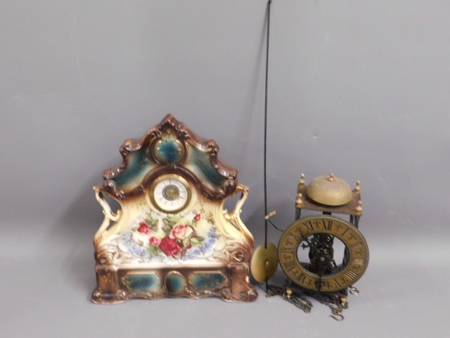 A pottery mantle clock, 12in tall twinned with a r