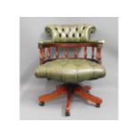 A button back leather desk chair, 31in high to bac