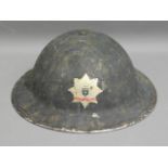 A vintage Fire Brigade helmet