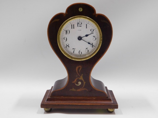 An Edwardian eight day balloon clock, 8.5in high