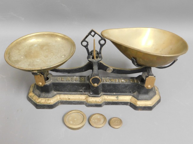 A set of brass kitchen scales