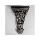 An ornate, antique plaster wall sconce, 13.5in hig