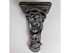 An ornate, antique plaster wall sconce, 13.5in hig