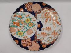 A large 19thC. Japanese Imari charger, repair to e