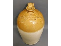 A stoneware flagon - 17.5in tall - Webb's Hotel Co