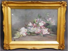 A gilt framed still life monogrammed J.T & dated /