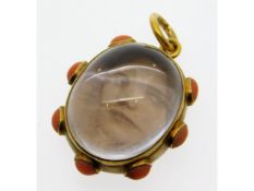 An antique yellow metal mounted memorial photo pendant set under crystal & mounted with coral, tests