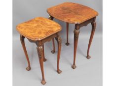 A nest of two tables with ball & claw feet, larges