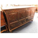 An antique oak mule chest with two drawers with ca