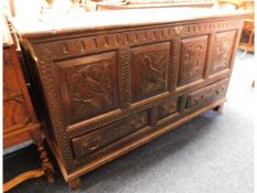 An antique oak mule chest with two drawers with ca