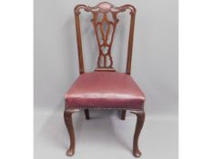 A Chippendale style mahogany chair with upholstere