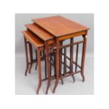 A nest of three mahogany tables, largest, 22in wid