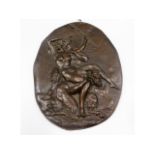 A 19thC. relief bronze plaque depicting Satyr with