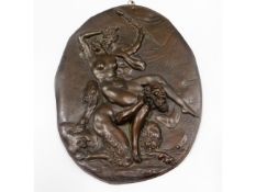 A 19thC. relief bronze plaque depicting Satyr with