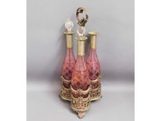 Three c.1900 cranberry colour cut overlay glass de