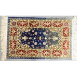 A small silk prayer mat from Hereke, Turkey, 28.5i