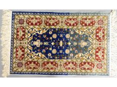 A small silk prayer mat from Hereke, Turkey, 28.5i