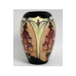 A Moorcroft pottery vase with floral art nouveau d