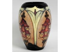 A Moorcroft pottery vase with floral art nouveau d