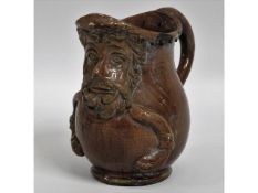 A Castle Hedingham Pottery jug by Edward Bingham,