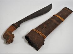 A Balinese Kris with scabbard, 21in long