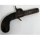 A 19thC. percussion pistol, 6in long