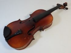 A 19thC. French violin labelled Jérôme Thibouville-Lamy, lacking strings, bow, one peg & bridge, cas