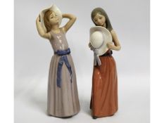 Two Lladro porcelain figures of ladies in summer d