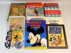 A quantity of annuals & items relating to Disney &