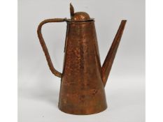 An arts & crafts copper kettle with repoussé decor