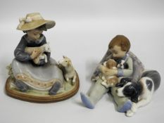 Two Lladro porcelain figures of children with youn