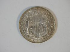 A 1914 George V silver half crown with lustre