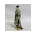 A Lladro porcelain figure of soldier with gun, 11.