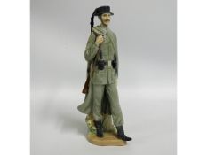 A Lladro porcelain figure of soldier with gun, 11.