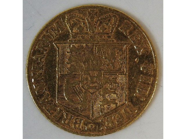 A George III 1817 shield back half sovereign, 3.9g