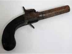 A 19thC. percussion pistol stamped Ulez, 7.5in lon