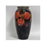 A Moorcroft pottery pomegranate vase, signed in bl